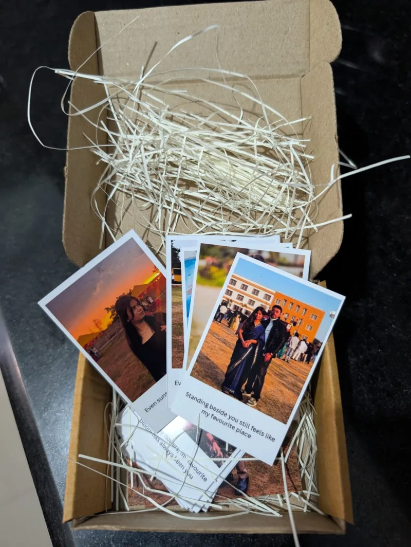 PrintPolaroid delivery box with couple anniversary polaroid prints and captions